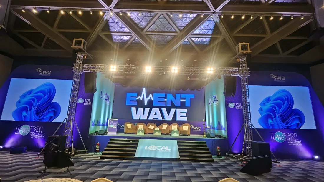 Event Wave conference stage with LED walls, truss lighting and speakers in Bengaluru